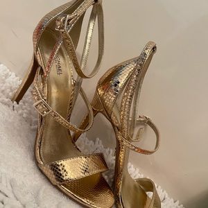 Michael Kors Heels- Gold in color, worn but the box is included.
